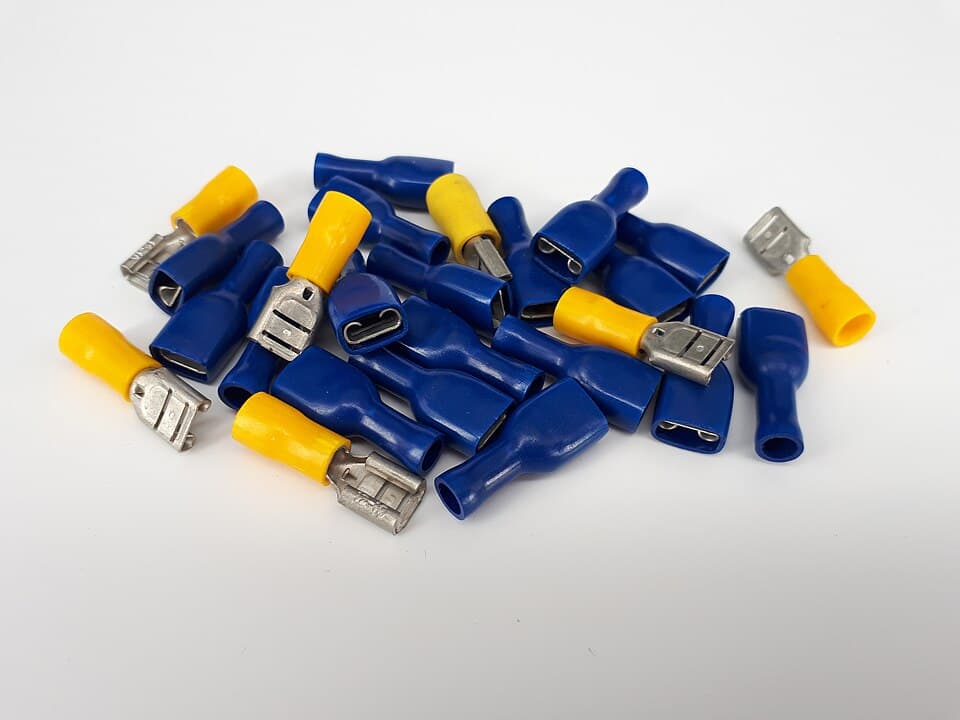 Blue and yellow insulated crimp terminals and spade connectors